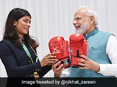 Nikhat Zareen Gifts Boxing Gloves To PM Modi, Hima Das Gives Traditional Gamocha