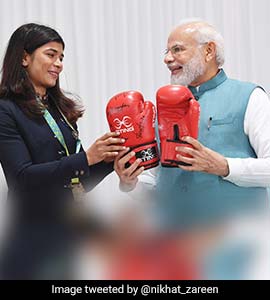 Nikhat Zareen Gifts Boxing Gloves To PM Modi, Hima Das Gives Traditional Gamocha