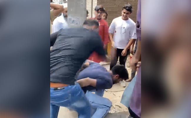 Video: On Suspicion Of Theft, Man Tied To Pole In Delhi, His Head Shaved