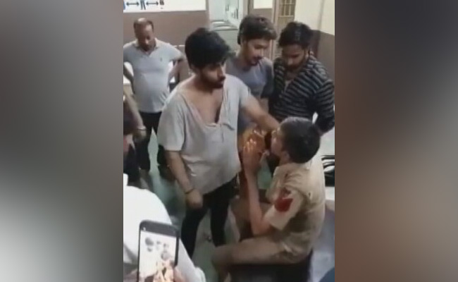 Video: Delhi Cop Cornered, Assaulted By Mob Inside A Police Station