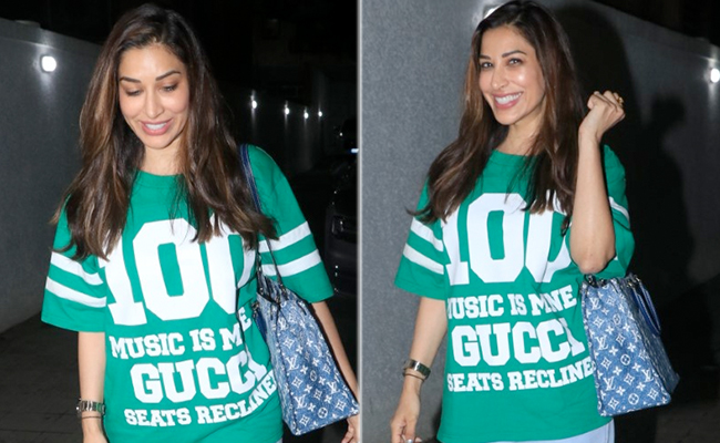 Sophie Choudry Elevates The Everyday Jeans And Tee With Her Gucci T-Shirt And Louis Vuitton Tote