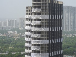Rains Bring Relief To People Near Noida's Twin Towers' Demolition Site Rains Bring Relief To People Near Noida's Twin Towers' Demolition Site