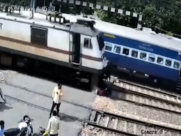 Watch: Man Abandoned Bike, Ran As Train Approached, Narrow Escape Watch: Man Abandoned Bike, Ran As Train Approached, Narrow Escape