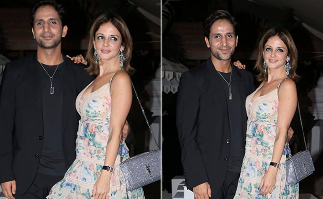 Sussanne Khan Is Every Bit A Chic Wedding Guest In A Floral Dress And Glittering Accessories