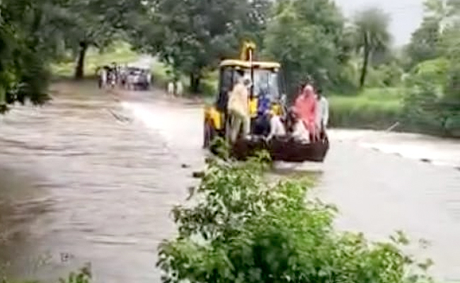 Watch: Pregnant Woman Carried On JCB In Flood-Hit Madhya Pradesh District