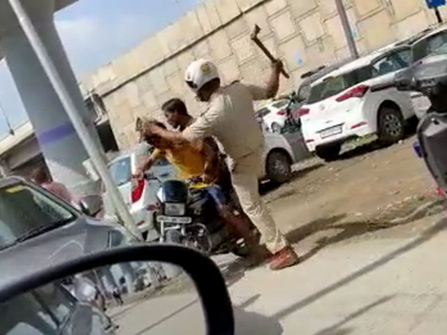Watch: Haryana Cop With Axe Threatens, Kicks Bikers
