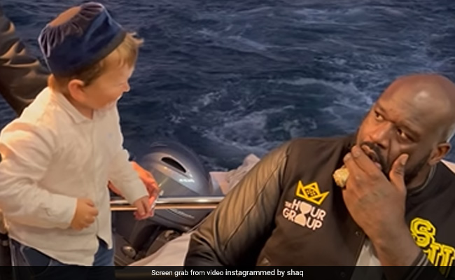 Watch: Shaquille O'Neal Gets "Knocked Out" By Internet Sensation Hasbulla