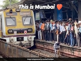 Video Of A Man In Mumbai Rescuing Dog From Railway Tracks Melts Hearts On Internet Video Of A Man In Mumbai Rescuing Dog From Railway Tracks Melts Hearts On Internet