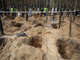 Ukrainians Search Mass Grave For Relatives After Russians Driven Out Ukrainians Search Mass Grave For Relatives After Russians Driven Out