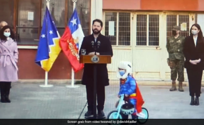 Viral Video: A Country's President Makes Speech, Child Cycles Around Him