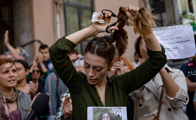 Pics: Protests After Iran Woman Died In Custody Spreads Across Countries