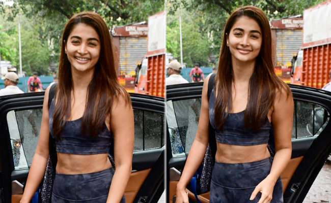 Pooja Hegde Is Ready To Take On The Weekend In A Tie-Dye Sports Bra And Matching Tights