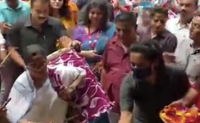 Watch: Mamata Banerjee Plays The <i>Dhak</i> At Durga Puja