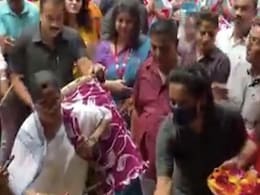 Watch: Mamata Banerjee Plays The <i>Dhak</i> At Durga Puja Watch: Mamata Banerjee Plays The <i>Dhak</i> At Durga Puja