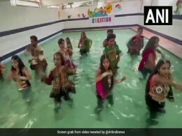 People Perform <i>Garba</i> Inside Swimming Pool Ahead Of <i>Navratri</i> People Perform <i>Garba</i> Inside Swimming Pool Ahead Of <i>Navratri</i>