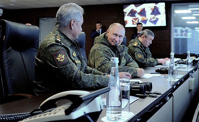 Putin Smiles With His Defence Minister As He Inspects Big Military Drills