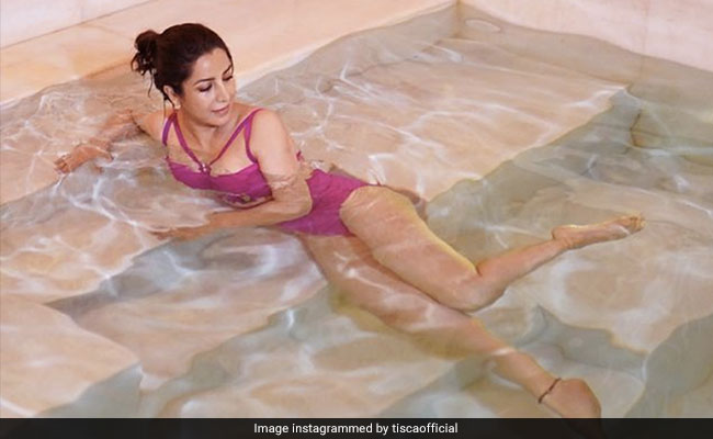 We Wish Every "Morning Done Right" Involved Tisca Chopra In A Gorgeous Pink Swimsuit