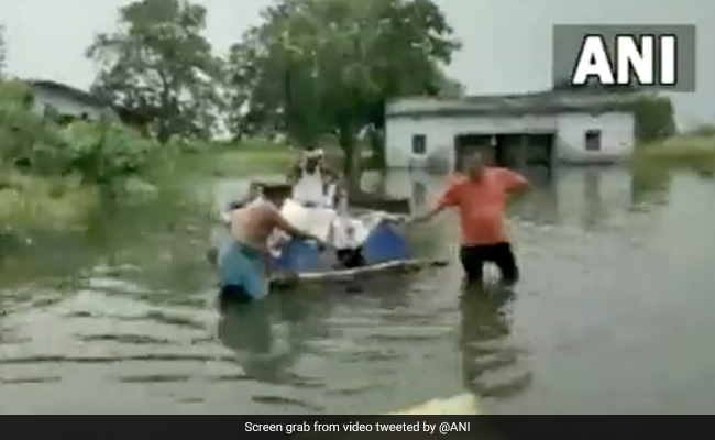 Watch: On Makeshift Boat, Villagers Take Sick Man To Hospital In Flooded Bihar