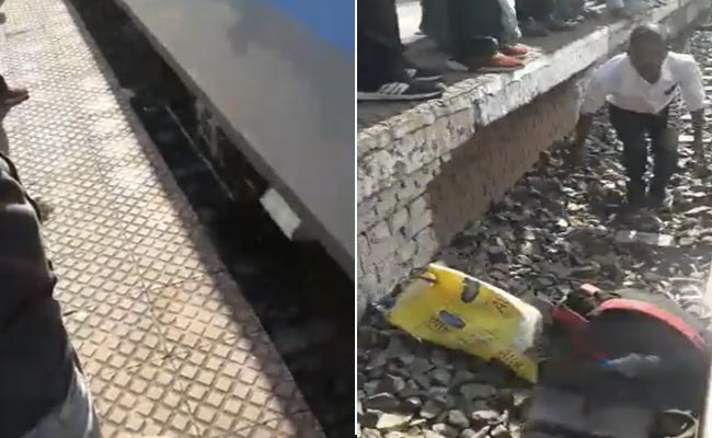शख्स के ऊपर से पूरी स्पीड में ट्रेन गुजर गई, मगर ईश्वर ने बचा लिया, देखें ख़तरनाक वीडियो