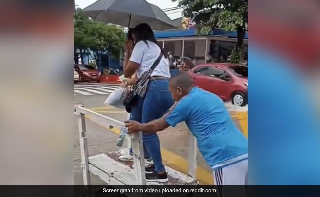 Viral Video: Man Earns Money During Inconvenience Caused By Rain, Internet Loves The Idea
