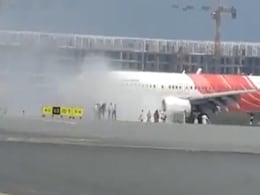 Air India Express Plane Catches Fire At Muscat Airport, Passengers Safe Air India Express Plane Catches Fire At Muscat Airport, Passengers Safe