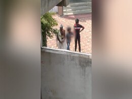 MP : मंदिर की थाली में रखे बादाम उठाने पर बच्चे को बांधकर पीटा, VIDEO वायरल होने पर एक्शन में आई पुलिस MP : मंदिर की थाली में रखे बादाम उठाने पर बच्चे को बांधकर पीटा, VIDEO वायरल होने पर एक्शन में आई पुलिस