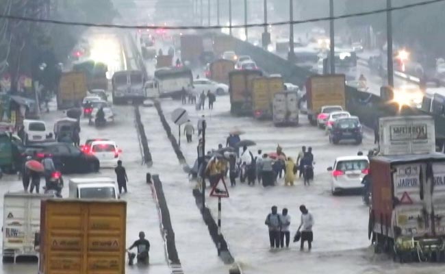 Video: People Walk On Flooded Delhi-Gurugram Expressway Amid Heavy Rain