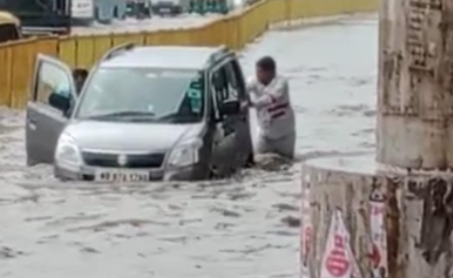 Video: On Getting SOS, Haryana Cop Pushes Car Out Of Deep Water