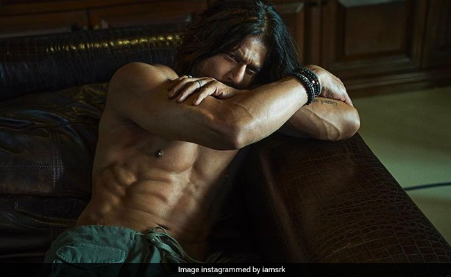 Sporting Long Locks And A Wrist Full Of Bracelets, A Shirtless And Shredded Shah Rukh Khan Is All Everybody Is Looking At