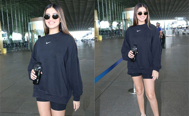 Tara Sutaria Is Sporty Cool As Ever In A Sweatshirt, Bicycle Shorts And A Pair Of White Sneakers