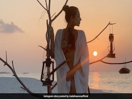 Malaika Arora Chases Sunsets In A Gorgeous Printed Swim Set Malaika Arora Chases Sunsets In A Gorgeous Printed Swim Set