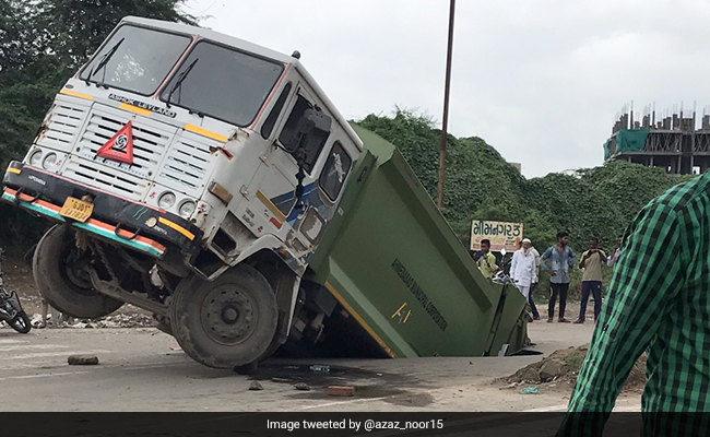 Viral Photo: Ahmedabad Road Caves In, Civic Body's Garbage Truck Falls Into It