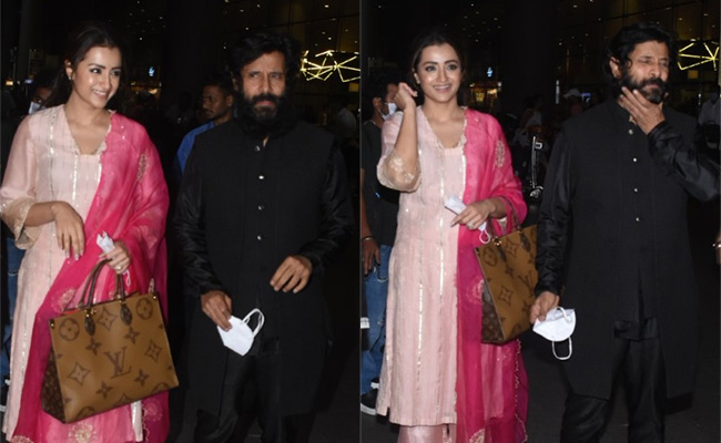 Trisha Krishnan Looks Chic As Ever For Her Travels In A Pink <i>Salwar</i> Suit And Louis Vuitton Bag