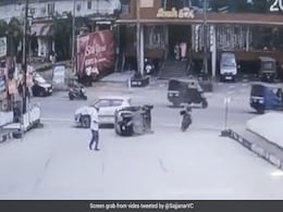 Caught On Camera: Woman Walking On Road Escapes Unhurt As Car Rams Autorickshaw Caught On Camera: Woman Walking On Road Escapes Unhurt As Car Rams Autorickshaw