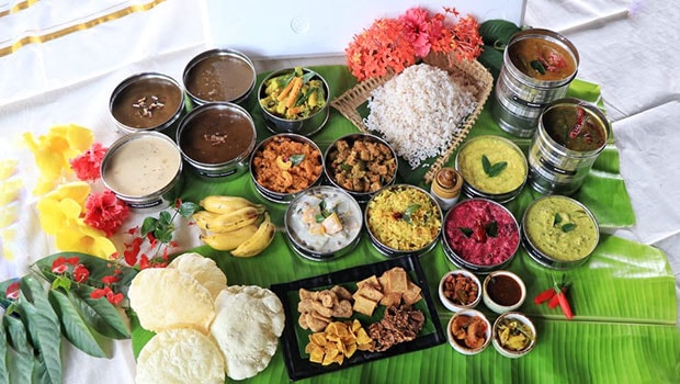 Onam feast is served on a banana leaf. Onam feast is served on a banana leaf.