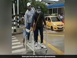 Man Helps People Cross Flooded Road For A Fee, Anand Mahindra Is Impressed Man Helps People Cross Flooded Road For A Fee, Anand Mahindra Is Impressed