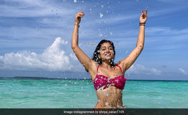 Birthday Girl Shriya Saran Makes A Splash In Maldives In A Magenta Swim Set