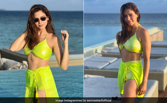 Aamna Sharif Showcases Her "Wildflower Heart And Seashore Soul" In A Neon Swim Set