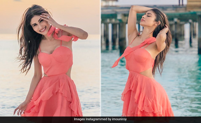 Mouni Roy Dances Right Into Her Maldivian Holiday In A Bright Pink Dress