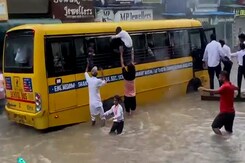 Video: Students Evacuated From Smoking Bus On Flooded Street Video: Students Evacuated From Smoking Bus On Flooded Street