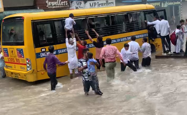 Video: Haryana Students Jump Out Of Bus On Waterlogged Road As Smoke Rises