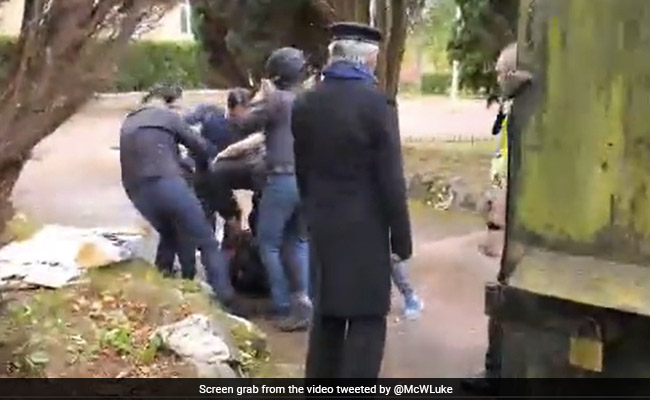 China Says Protesters "Illegally Entered" Consulate After UK Assault Video