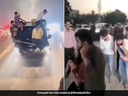 Watch: Men Bursting Firecrackers On Car's Roof Detained In Ahmedabad Watch: Men Bursting Firecrackers On Car's Roof Detained In Ahmedabad
