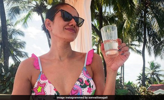 Goodbye Monday Blues And Hello Sonnalli Seygall In A Peppy Pink Printed Swimsuit