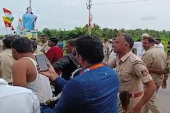 Watch: Karnataka Cops Beat Congress Worker, Take Off His 'PayCM' T-Shirt Watch: Karnataka Cops Beat Congress Worker, Take Off His 'PayCM' T-Shirt