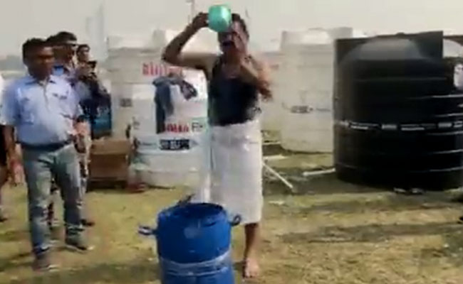 Watch: After BJP MP's Abusive Tirade, Delhi Official Bathes In Yamuna Watch: After BJP MP's Abusive Tirade, Delhi Official Bathes In Yamuna