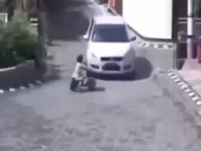 Viral Video: Girl Miraculously Survives After Being Run Over By Car