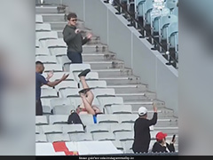 Watch: Spectator Takes A Tumble In Stands While Trying To Catch Ireland Batter's Six