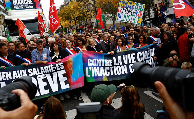 Thousands Of Protesters March In Paris Over Soaring Prices