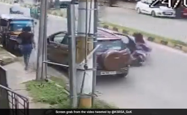 Video: Woman Rider Run Over After Being Hit By Door Of Parked Car